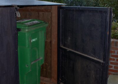 Pacific Heights Jewel: Creative brickwork fronting a 100-year-old house with custom bike shed and family heritage tree as focal point.