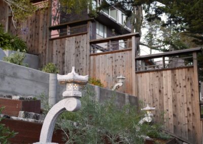 Pacific Rim Fusion: On a steep site under sandy conditions we melded Japanese aesthetics with landscape lighting and California native plants.